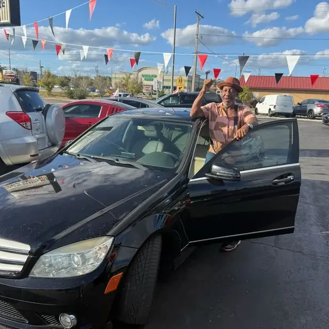 Happy customer with their new car