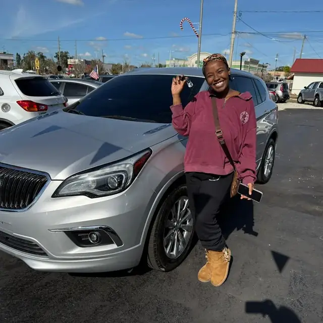 Family picking up their vehicle