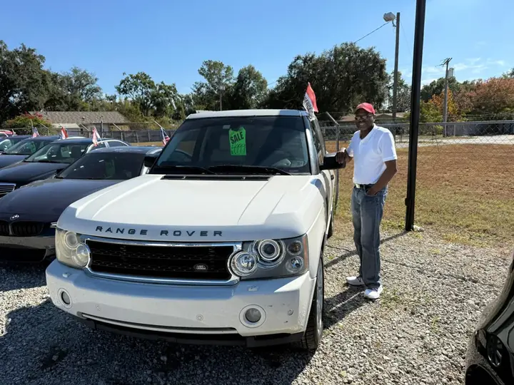 Happy customer with their Range Rover at Company Car
